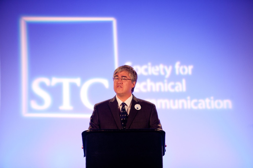 Photo of Steve Jong at the podium of the 2011 STC Summit